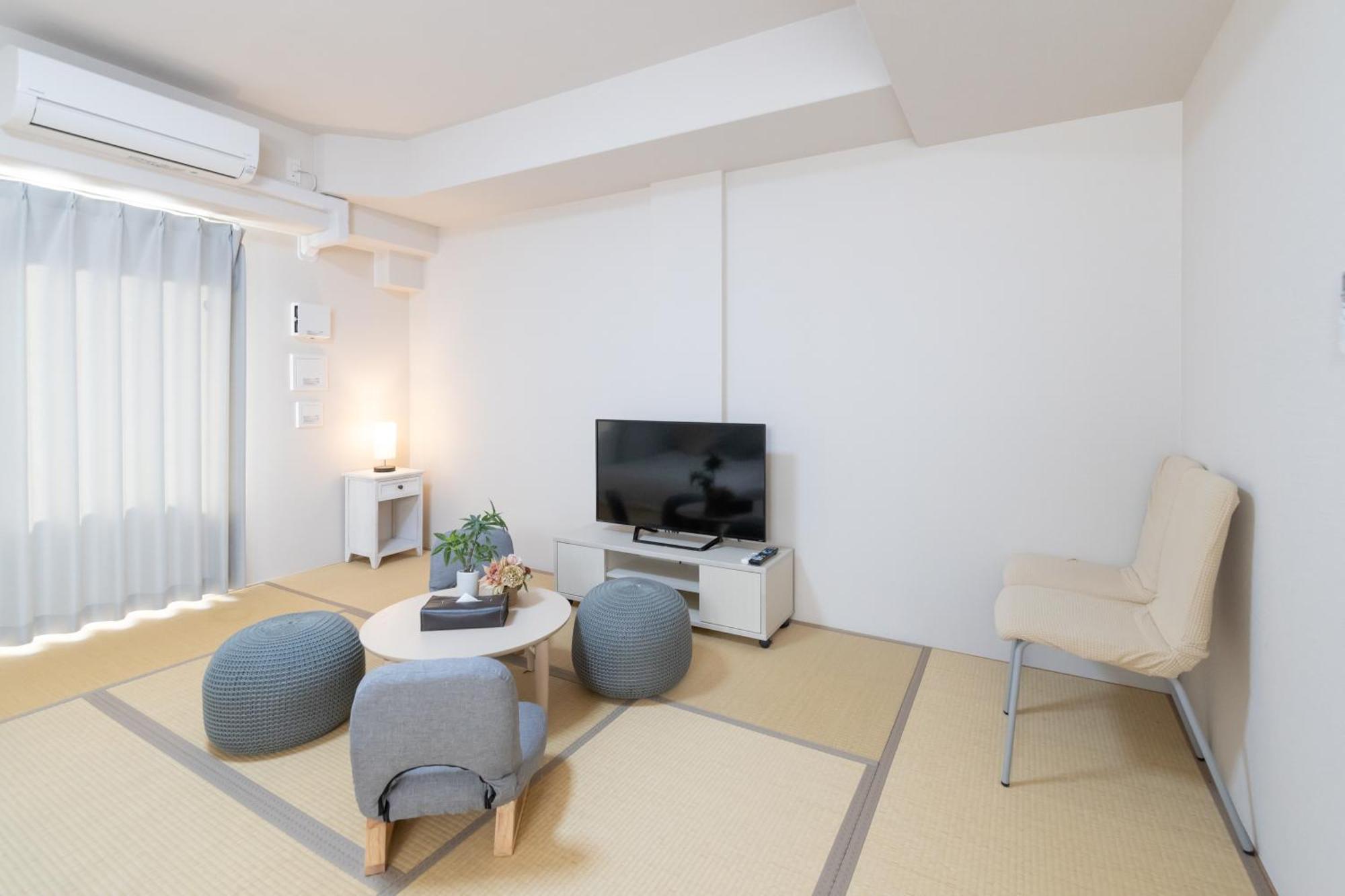 Appartement Rewit Building à Ōsaka Chambre photo