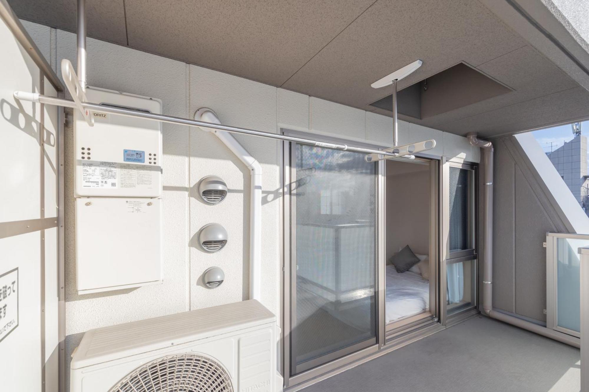 Appartement Rewit Building à Ōsaka Chambre photo